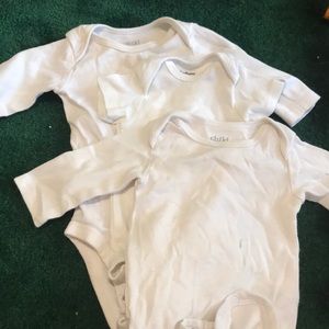 3 plain white onesies